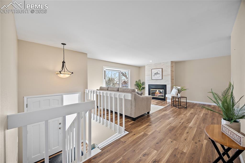 Image 3 of 45: Spacious living room with gas fireplace 