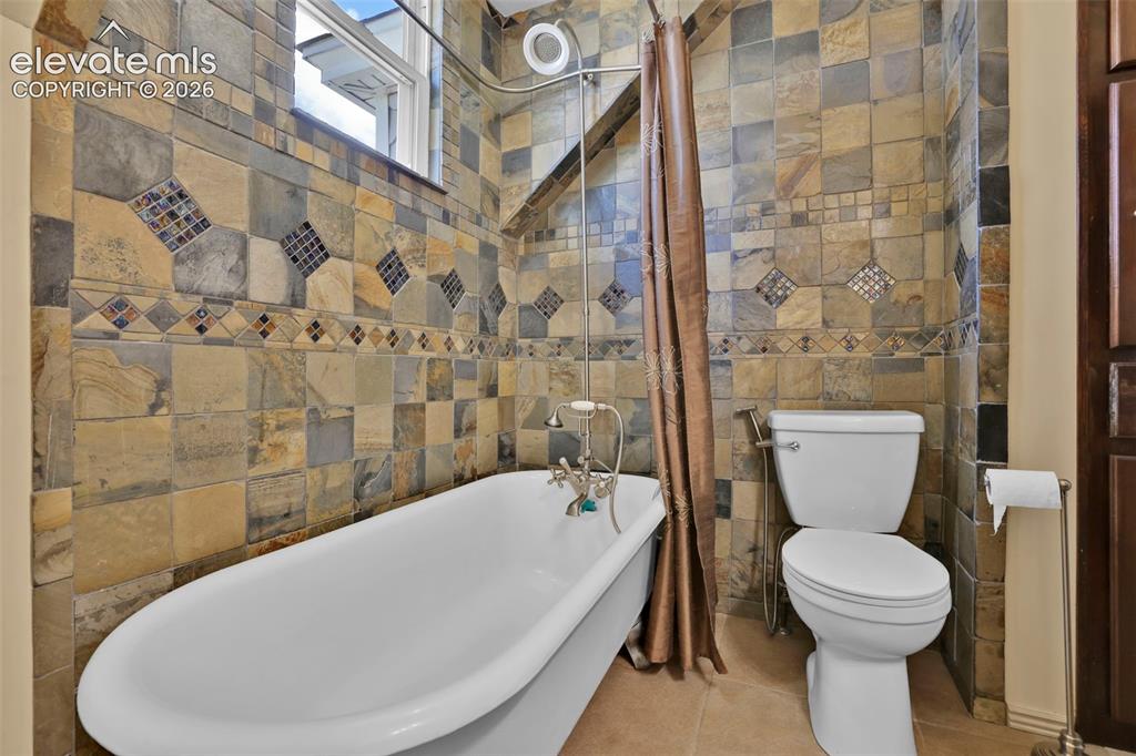 Image 32 of 48: Upstairs--full bath