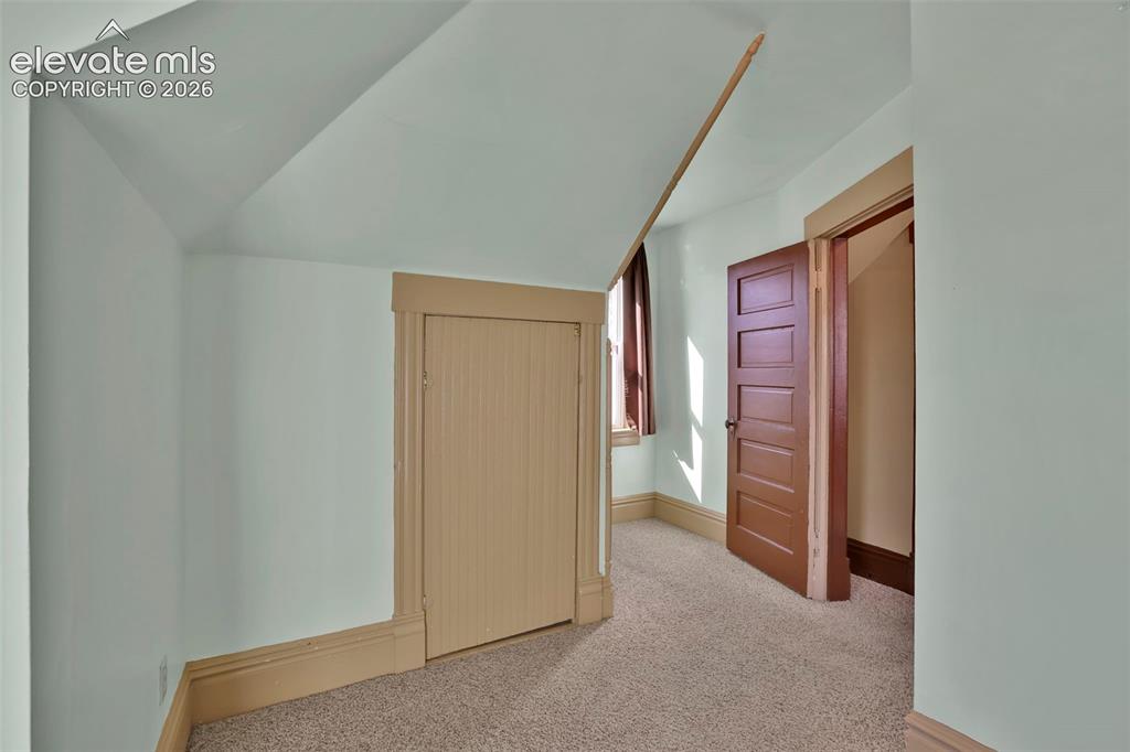 Image 35 of 48: secondary upstairs bedroom