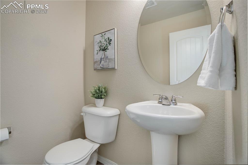 Image 10 of 23: Powder room - main level