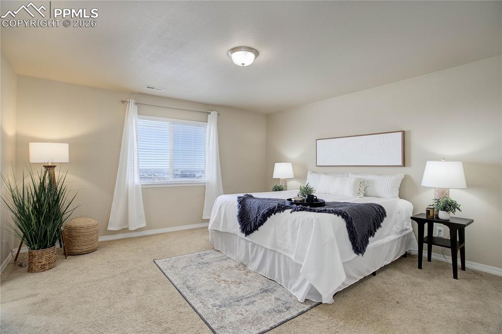 Image 13 of 23: Primary suite - upper level