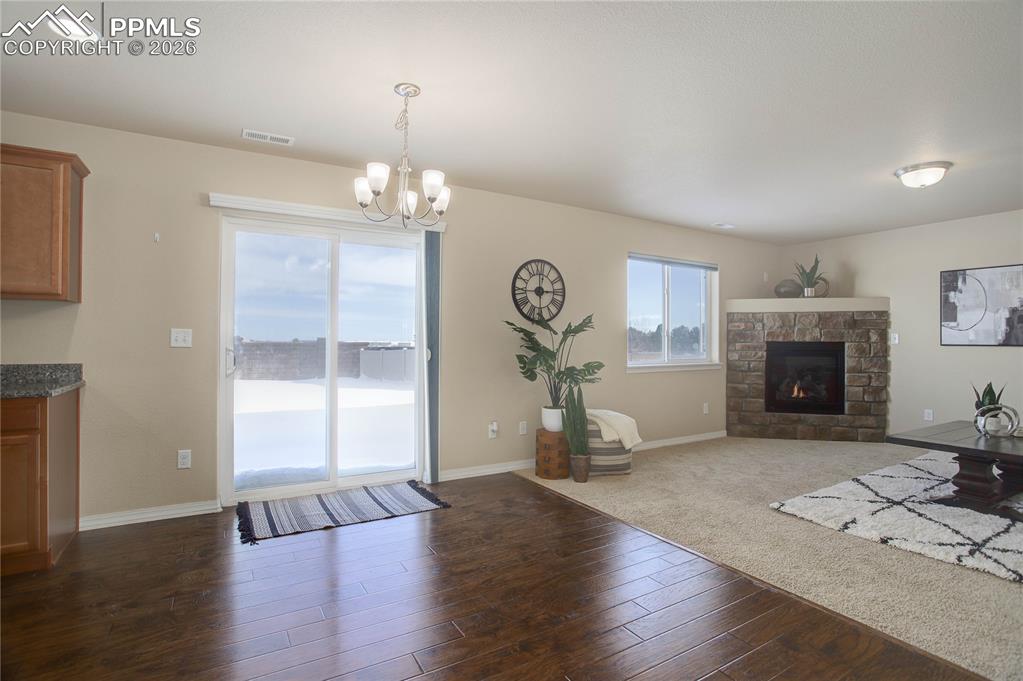 Image 6 of 23: Dining area w/ walk-out