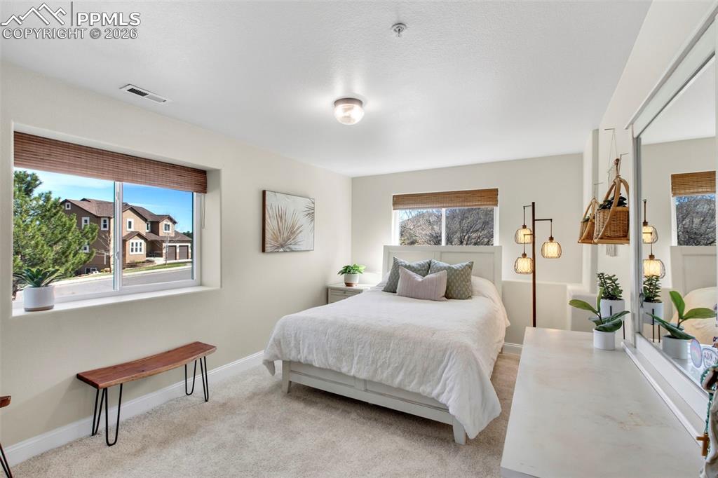 Image 40 of 49: Basement Bedroom