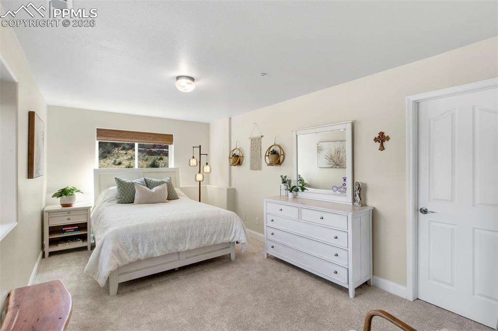 Image 41 of 49: Basement Bedroom