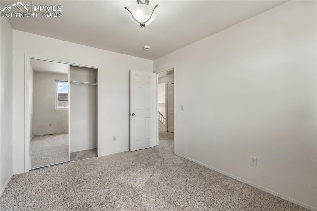 Image 24 of 43: Virtually Staged, family room, large bright windows, cozy gas fireplace, op