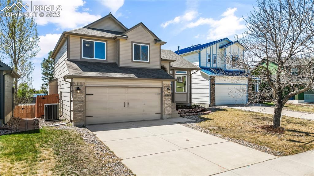 Image 42 of 43: Conveniently located in the hall between the bedrooms, closet fits full siz