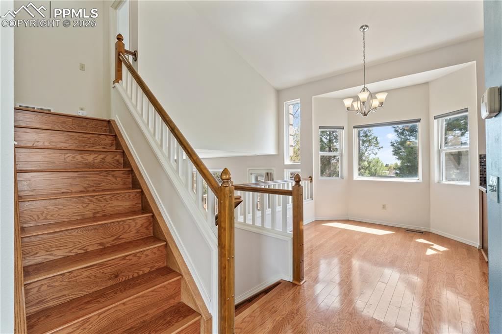 Image 7 of 43: Virtually Staged
Inviting entry with bright lighting, tile flooring at ent