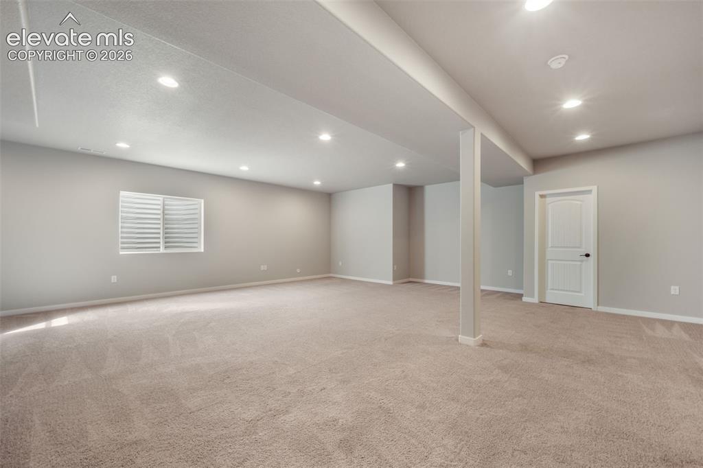 Image 41 of 50: Stubbed for future wet bar, or kitchen area.