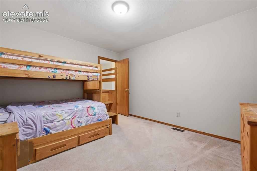 Image 16 of 28: Bedroom