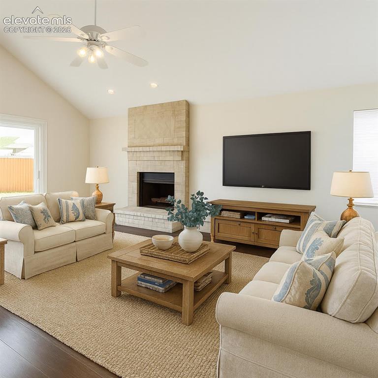 Image 2 of 15: Vaulted ceiling with recessed lighting and a ceiling fan