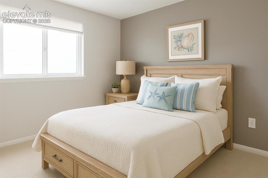 Image 6 of 15: Neutral painted walls with a feature wall, double-pane window, and carpeted