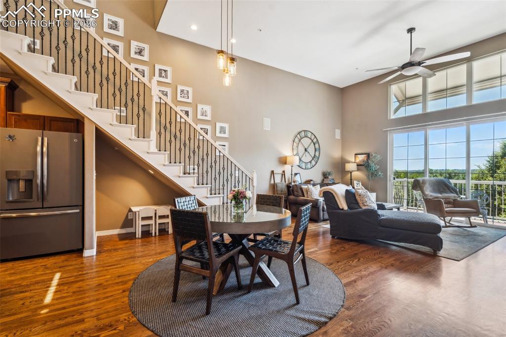 Image 9 of 50: Main House Staircase and Dining Area