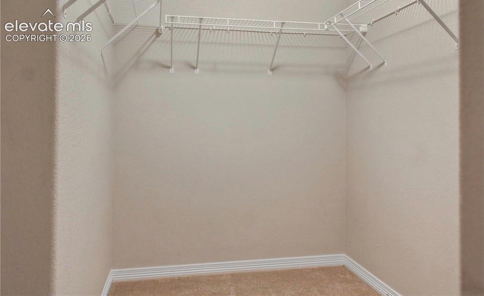 Image 10 of 19: Walk in Closet