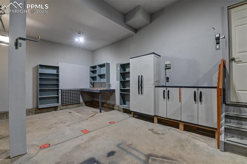 Image 43 of 47: Shelving and Storage in the Garage.