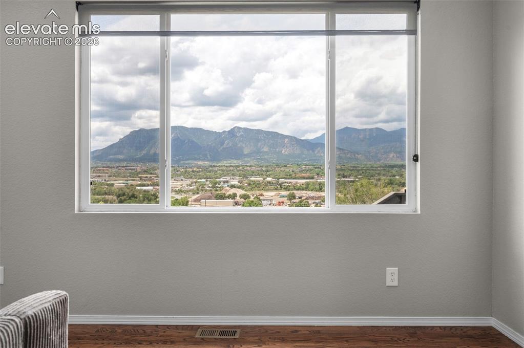 Image 9 of 34: view of Cheyenne Mountain from the living room