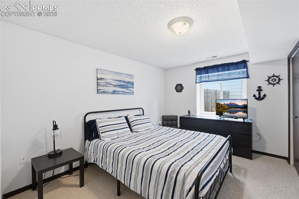 Image 23 of 35: Bedroom