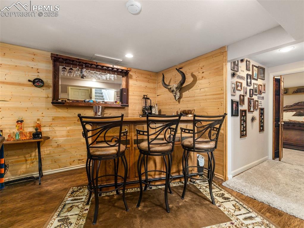 Image 28 of 50: Basement bar in family room