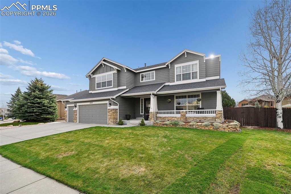 Caption: Beautifully maintained home with standout curb appeal in a highly desirable neighborhood