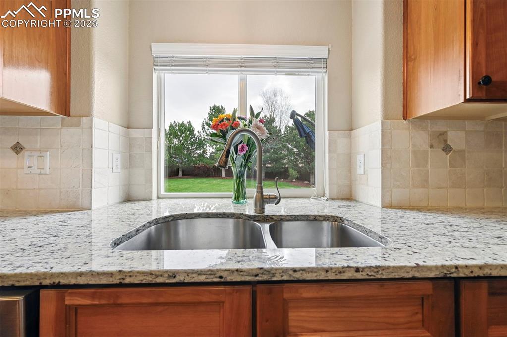 Image 12 of 44: Thoughtfully designed layout keeps you connected while cooking and entertai