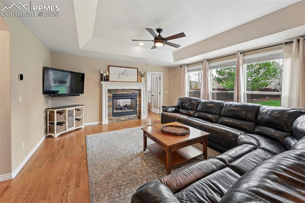 Image 16 of 44: Spacious great room with natural light and open sightlines to the kitchen
