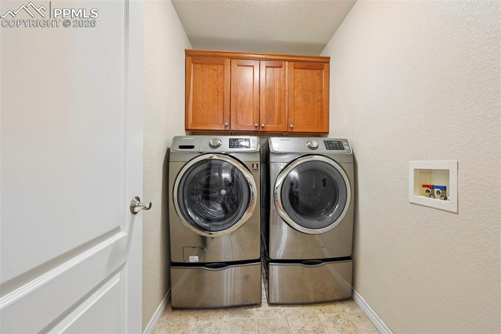 Image 20 of 44: Convenient main-level laundry designed for everyday functionality