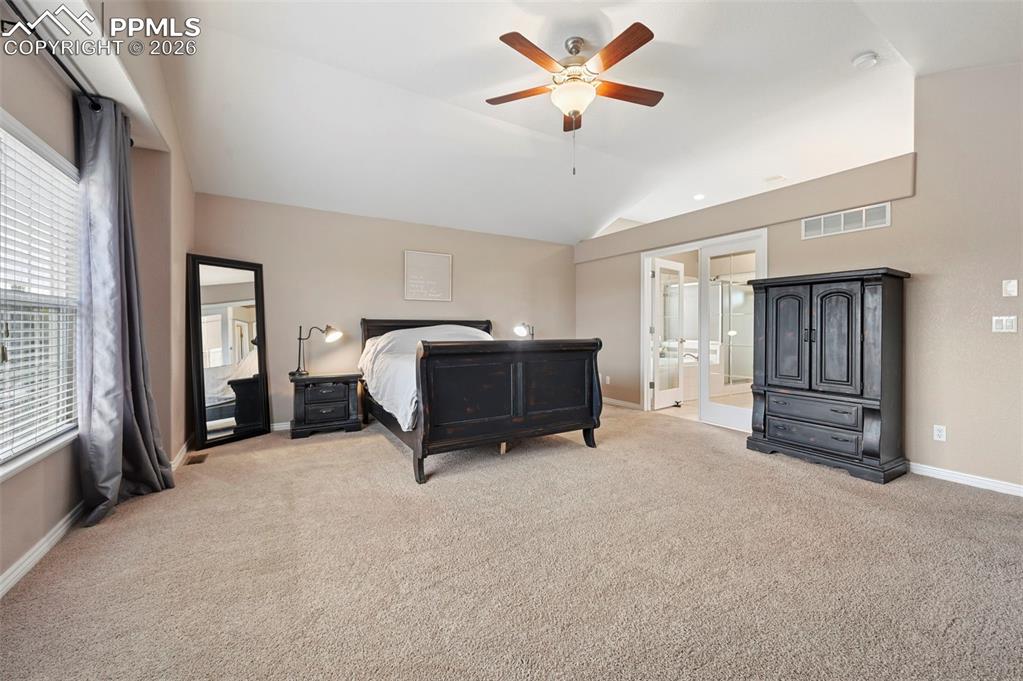 Image 24 of 44: Spacious primary suite offering comfort, privacy, and natural light