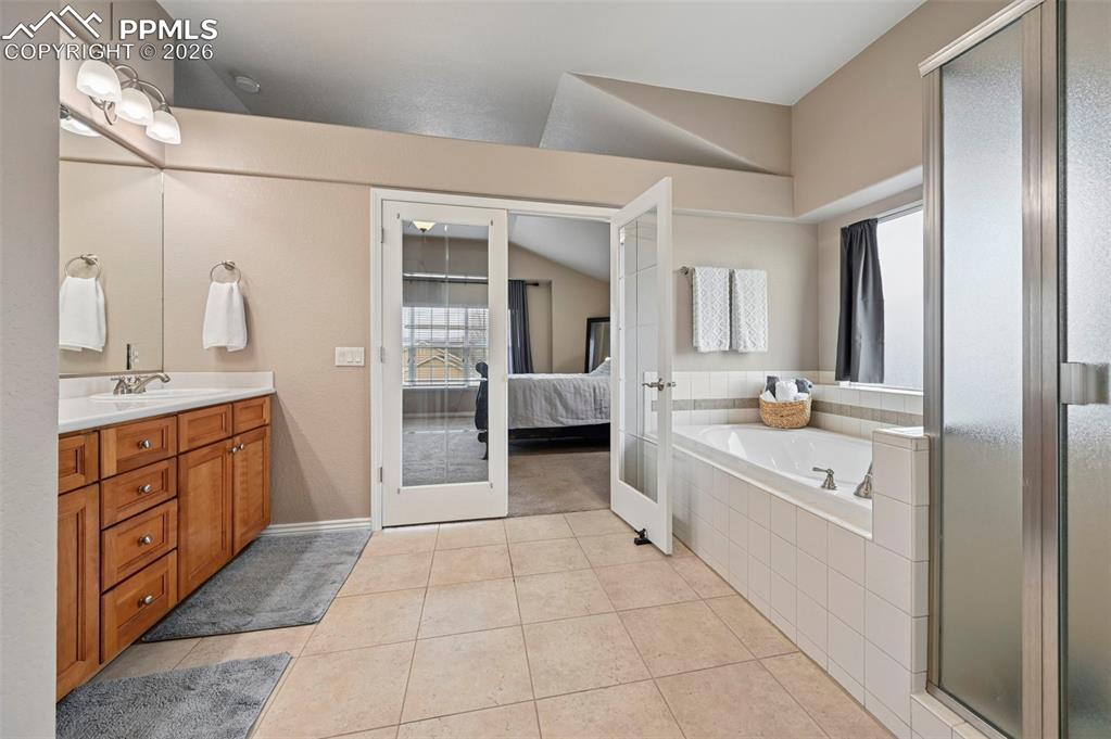 Image 27 of 44: Clean, well-maintained bath with space to personalize over time