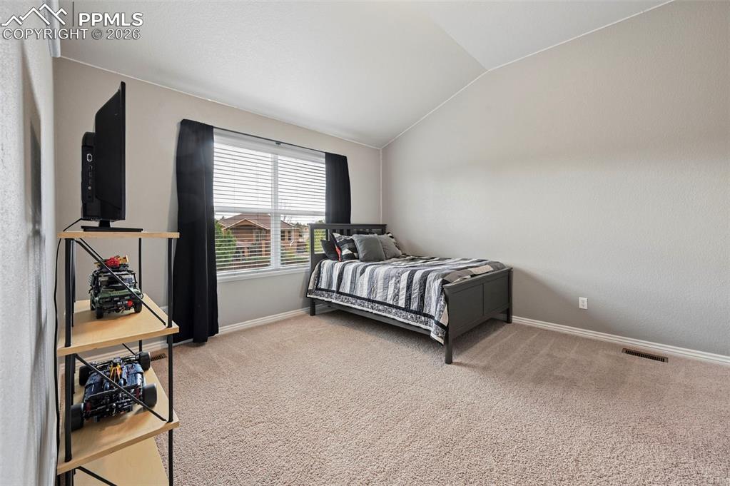 Image 31 of 44: 3rd bedroom with versatile layout and great light