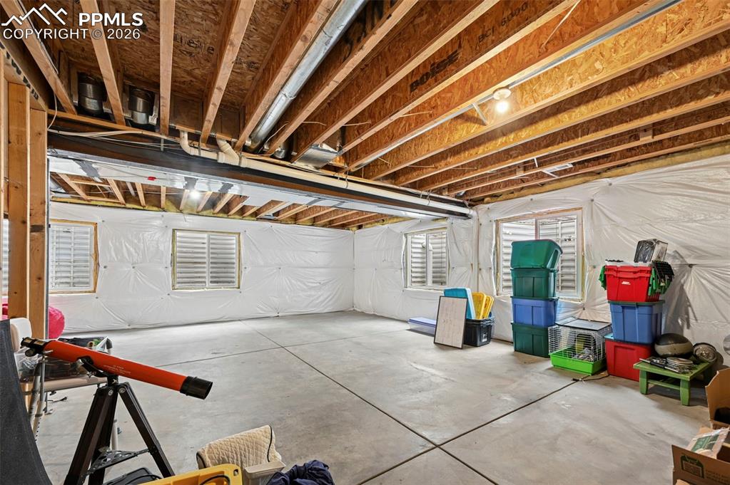Image 36 of 44: Over 1,400 sq ft of unfinished basement ready to customize