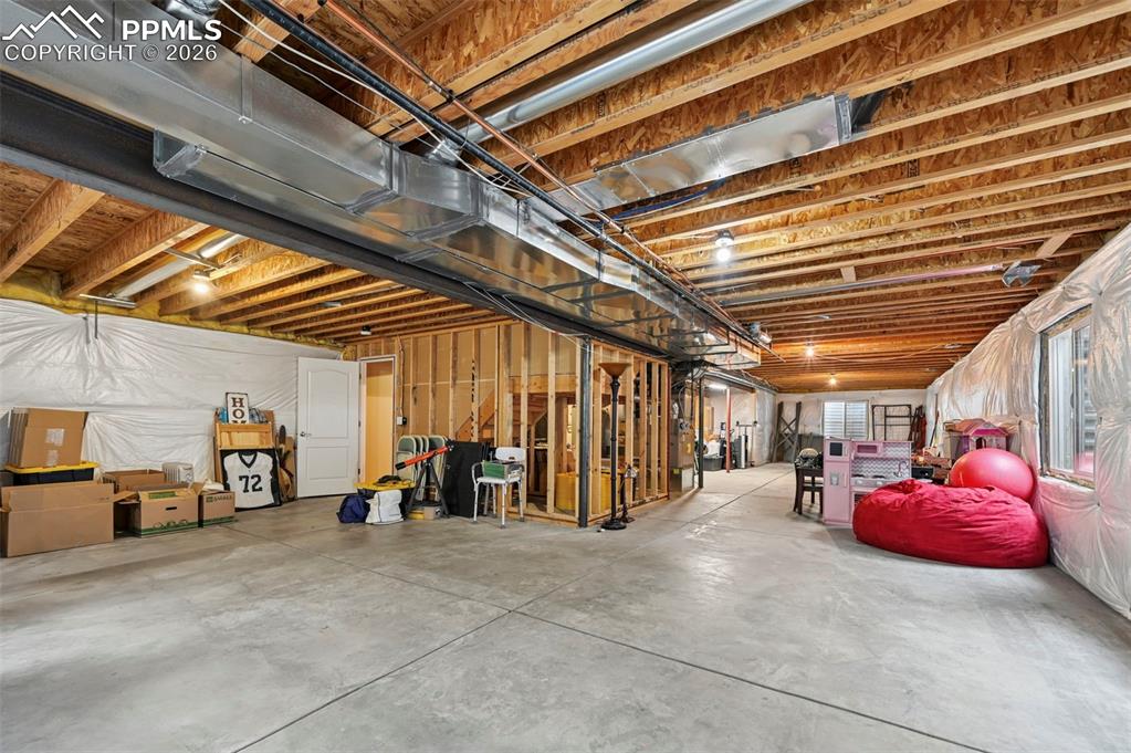 Image 37 of 44: Expansive lower level with endless potential for additional living space