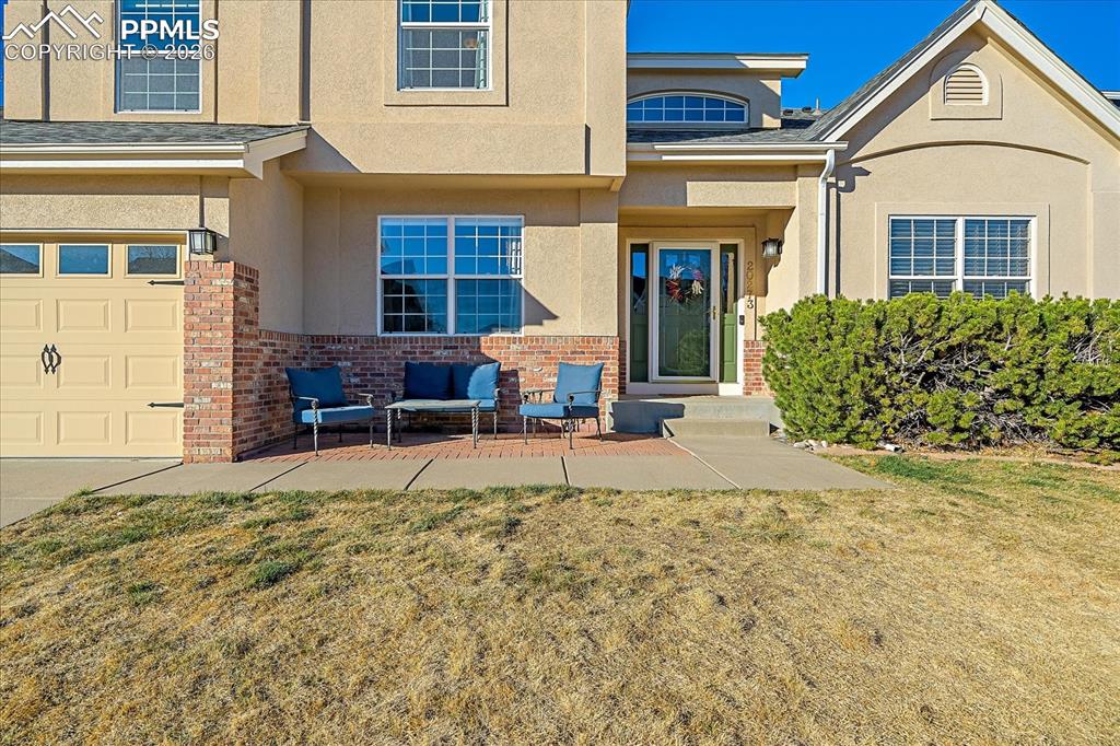 Image 2 of 50: Front Exterior and Front Patio