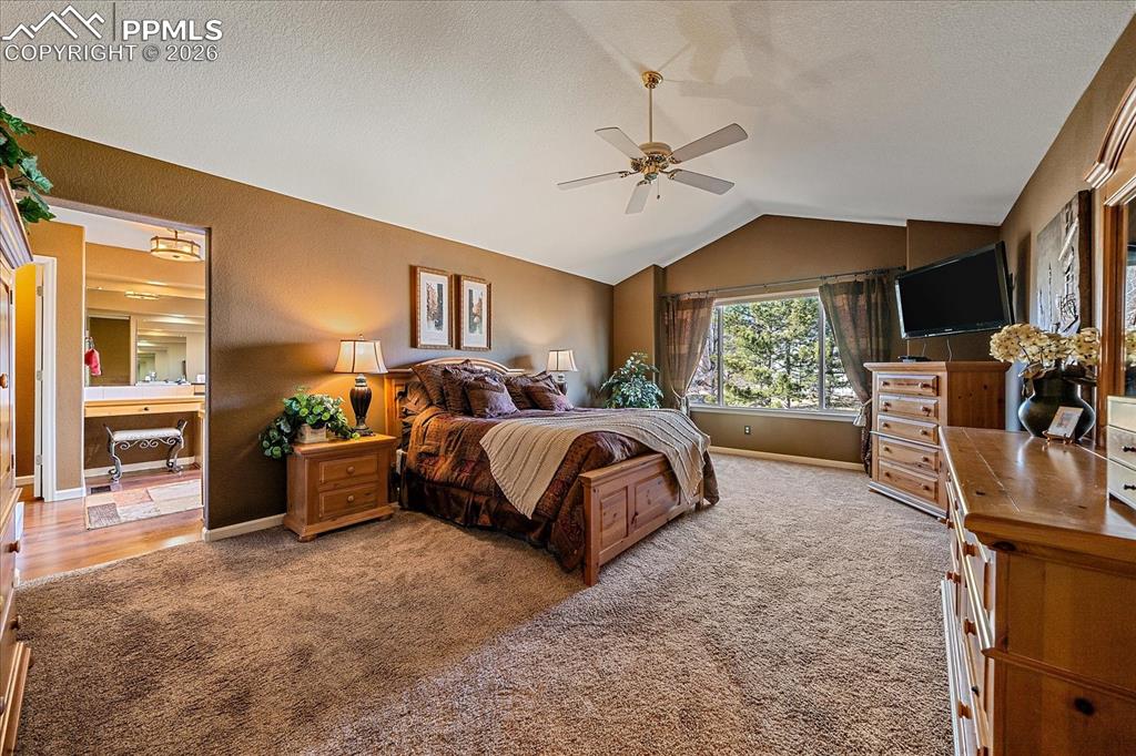 Image 20 of 50: Primary Bedroom with ensuite bath