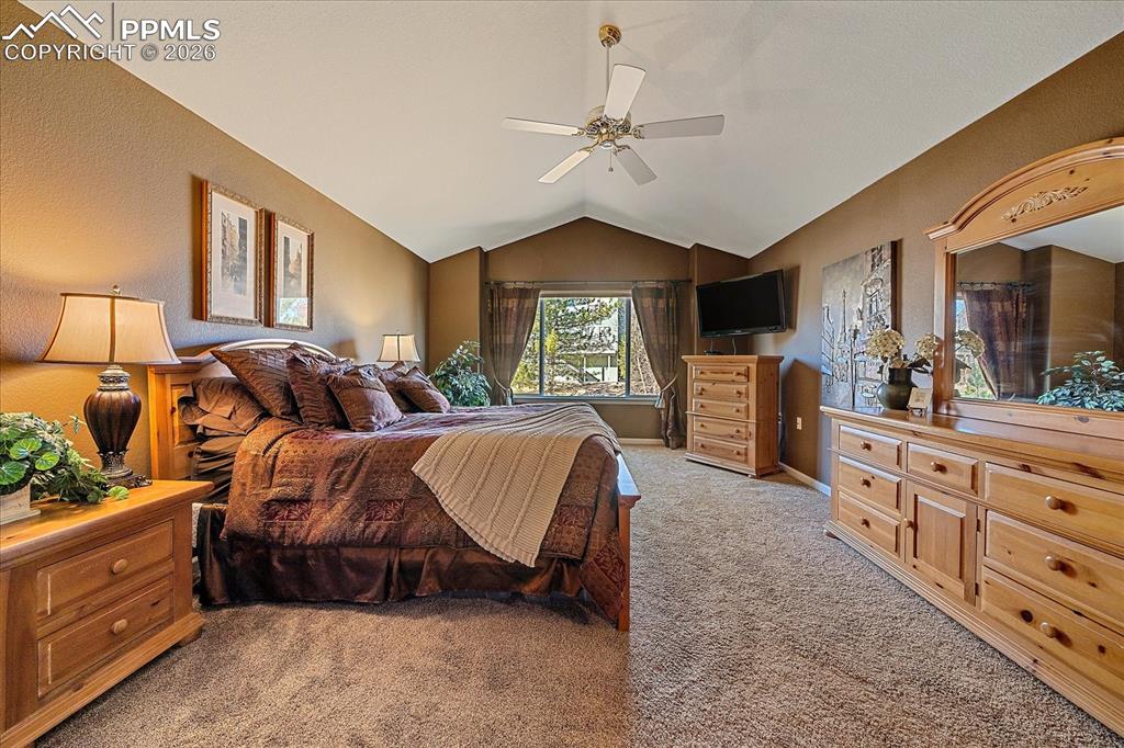 Image 21 of 50: Primary Bedroom with ensuite bath