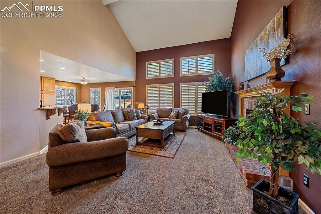 Image 4 of 50: Great Room/Living Room with Fireplace