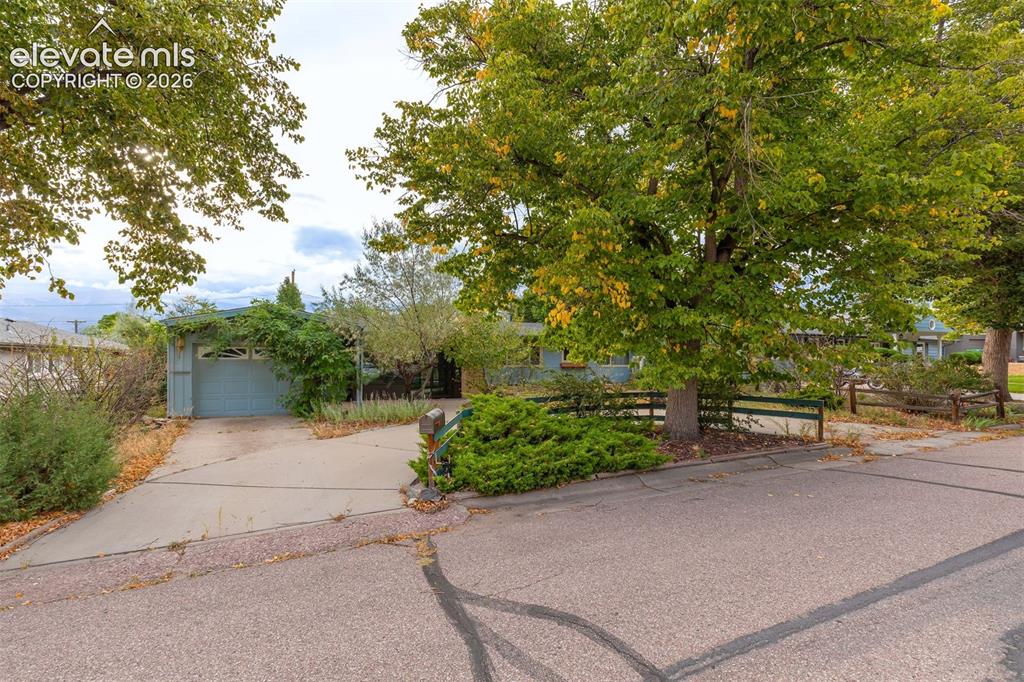 Caption: Over 1800 sq.ft. home, all one level, with two garages. All within 2 minutes to UCCS. Ready for an i