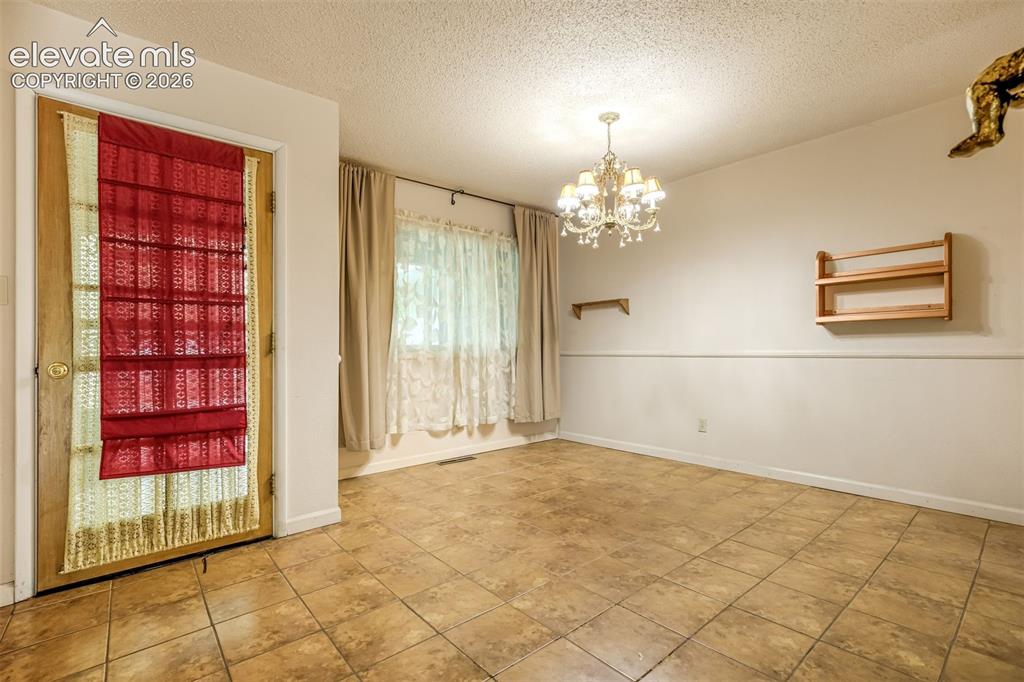 Image 4 of 11: Dining area just off the living room & kitchen. 