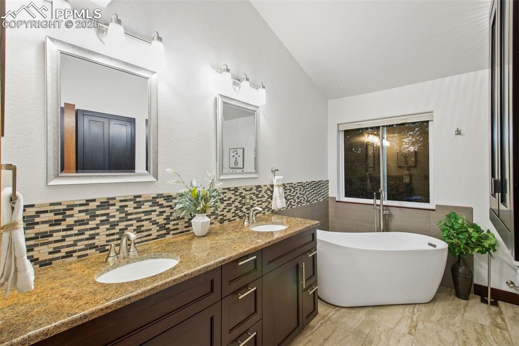 Image 15 of 28: Spa-Inspired Primary Bathroom