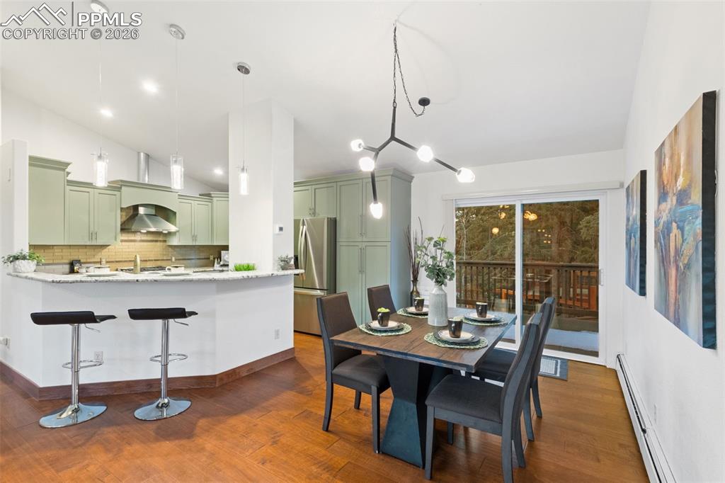 Image 8 of 28: Dining with Forest Views