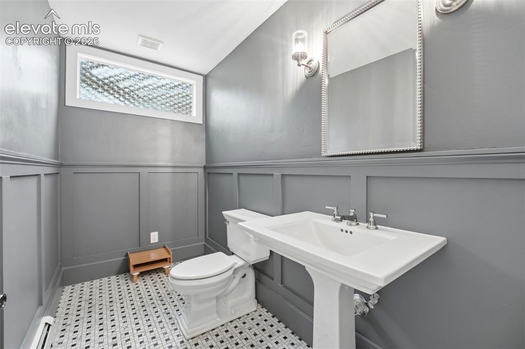 Image 16 of 50: Powder bath on main level