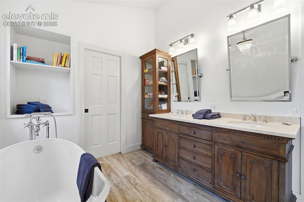 Image 21 of 50: Updated 5 piece primary bathroom with walk out to private balcony
