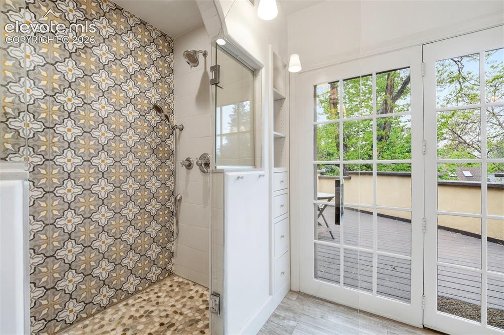 Image 22 of 50: Stunning shower in primary bathroom 