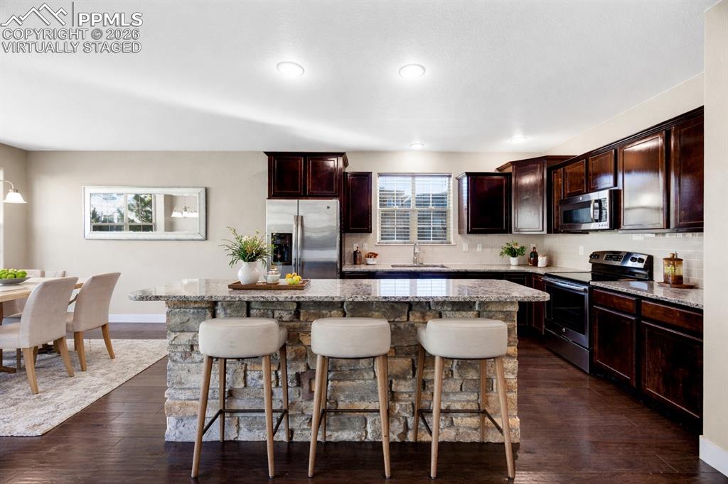 Image 7 of 44: “Virtually Staged” for MLS use Kitchen