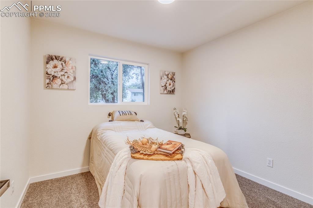 Image 14 of 38: Bedroom