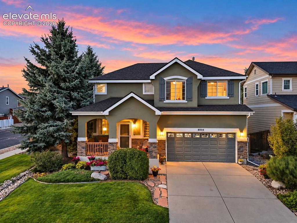 Caption: WELCOME HOME — inviting curb appeal introduces a home designed for comfortable everyday living and g