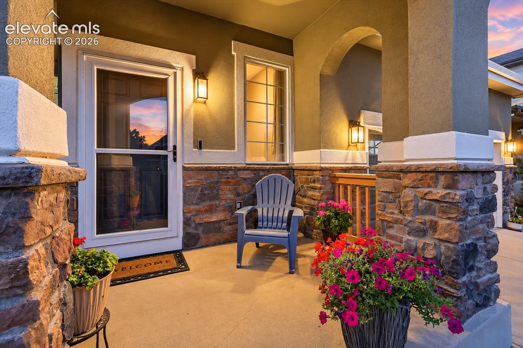 Image 11 of 50: A welcoming covered front entry creates a warm first impression and a charm