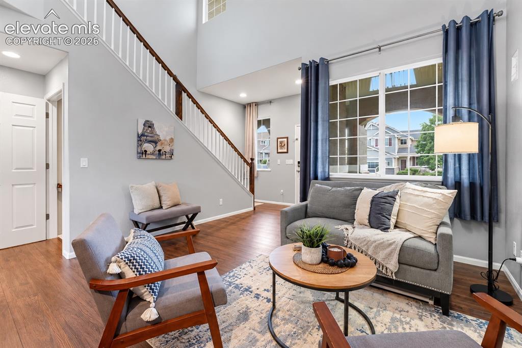 Image 18 of 50: Bright, open living spaces flow naturally toward the front entry, creating