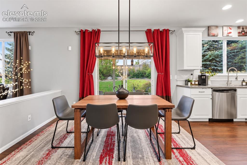 Image 23 of 50: A dedicated dining area offers plenty of room for weeknight dinners, family