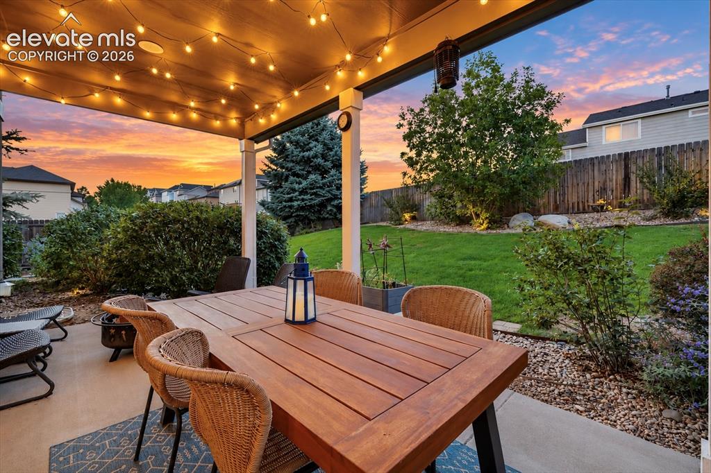 Image 24 of 50: Step outside and enjoy an inviting extension of the home