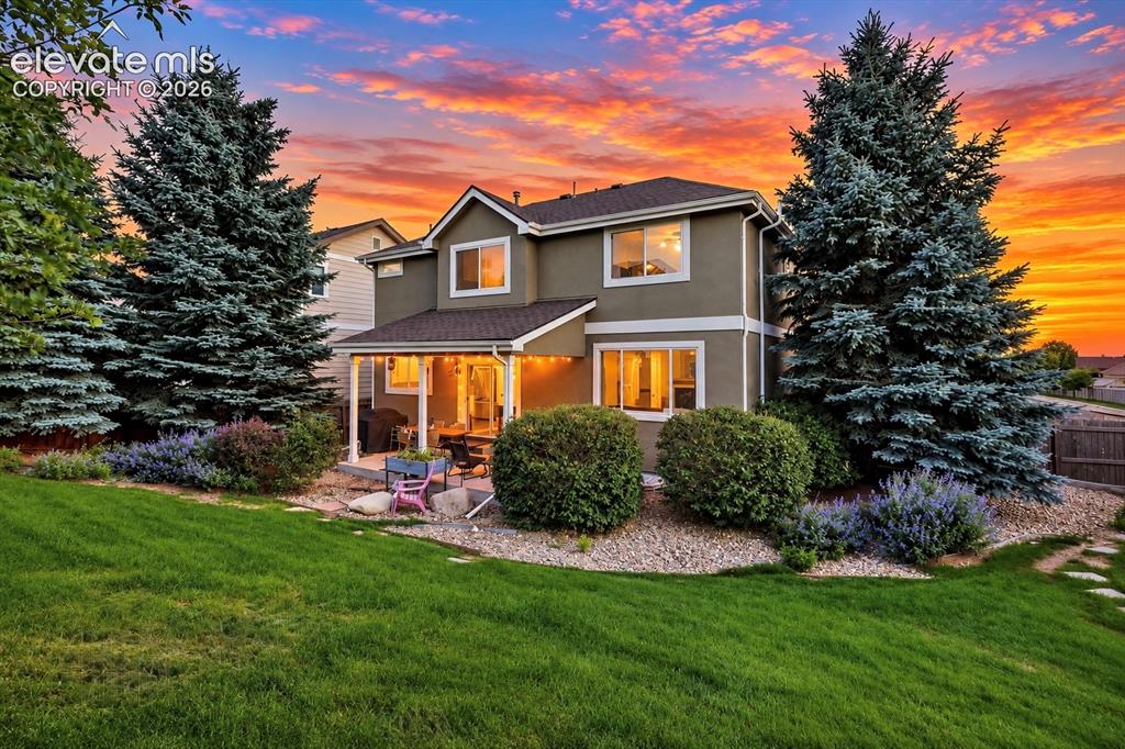 Image 3 of 50: A private backyard gives everyone room to relax, play and enjoy Colorado