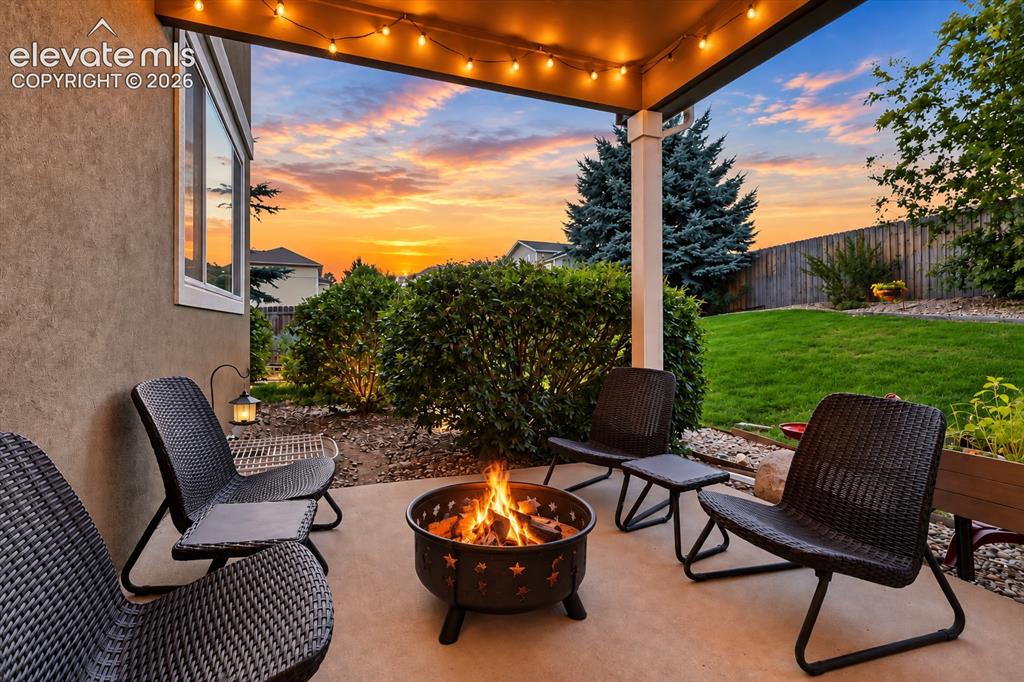 Image 43 of 50: The outdoor spaces offer room for everything from quiet mornings to summer 